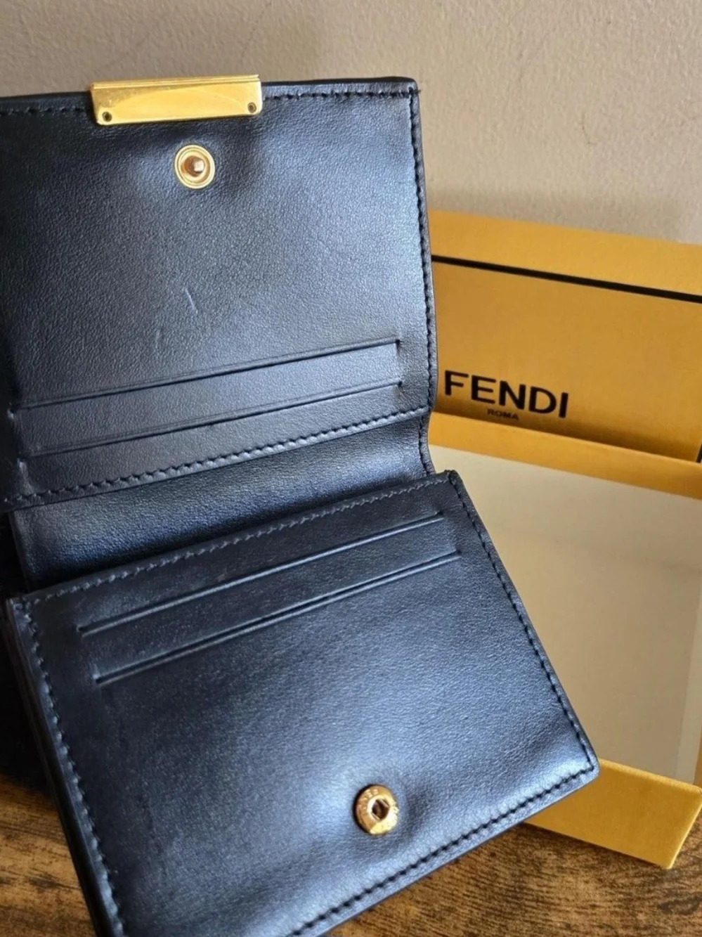 Fendi Black Leather Compact Wallet with Gold FF Buckle